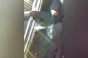 The masked man captured by CCTV after the burglary in Harrogate