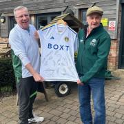 1.	Chris Mitchell from Lavender Fields Care Village and Karl Avison with the signed Leeds United shirt Chris Mitchell and Karl Avison