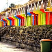 Beach huts at Scarborough by Christine Hainsworth