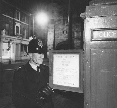 As York sleeps PC Thomas Watkinson reports in to HQ from a police box on Bootham. From the Evening Press, 31/3/1964.
