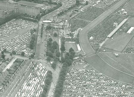 An aerial view of Knavesmire in 1957 on Ebor Day.  The Evening Press caption read, "Thousands of people swarming over the enclosures, hundreds of neatly-parked cars, and scores of coaches."