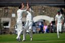 Two of Crossflatts' first team stars, prolific seamer Jim O'Hara and wicket-keeper/captain Dom Bennett (pictured here celebrating a wicket), will get the chance to showcase their skills in the Bradford Premier League from 2021 Picture: Andy Garbut