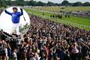 The huge crowd at York Racecourse for the final day of the Sky Bet Ebor Festival, with (inset) Frankie Dettori celebrating   after winning with Trawlerman. Pictures: Mike Egerton/PA