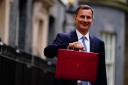Chancellor of the Exchequer Jeremy Hunt leaving11 Downing Street, London, with his ministerial box before, before delivering his Budget