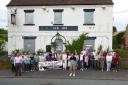 Members of the Skelton-on-Ure community group outside the Black Lion in the village