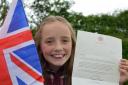 ROYAL REPLY: Zara Ritchie, ten, of Wigginton, with her letter from the Queen  Picture: Simon Ritchie