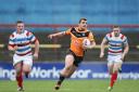 FRONT-RUNNER: Ed Smith, racing clear of the Rochdale defence during York City Knights' superb Challenge Cup win at Bootham Crescent, is the early leader in The Press Player of the Year standings. Picture: Gordon Clayton