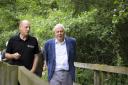 Sir David Attenborough on the boardwalk at Askham Bog with Rob Stoneman, the Yorkshire Wildlife Trust's chief executive
