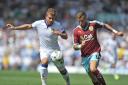 Leeds United's Gaetano Berardi (left) battles with Burnley's Michael Kightly during the Sky Bet Championship match at Elland Road, Leeds. Picture date: Saturday August 8, 2015. See PA story SOCCER Leeds. Photo credit should read: Dave Howarth/PA W