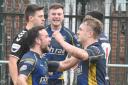 Acorn's Ryan Gallacher, right, scores a try against Featherstone Lions and celebrates with his team-mates Picture: Nigel Holland