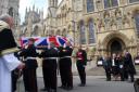 Marine David Hart's coffin is carried from York Minster.