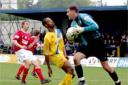 York City goalkeeper Tom Evans dashes out to halt a St Albans raid