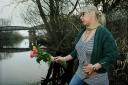 Jordan Sullivan’s mother, Nicola Jobling, throws roses into the river close to the spot where he died