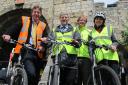 Saddled up for the Olympic Torch, from left, are  Graham Titchener, programme manager i-Travel York; Coun Dave Merrett; Shaun Wilkinson, road safety training co-ordinator; Jayne Ward, school crossing patrol supervisor