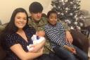 Cpl Jay Grundy with wife, Lisa, baby Oscar and Lisa’s son, Jermaine