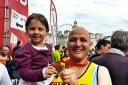 James Howard with daughter Lilly      proudly holding his medal after completing the London Marathon