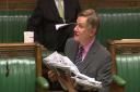 York Central MP Hugh Bayley in the House of Commons with the petition forms