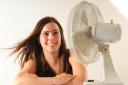 Carys Brain appreciates the cooling effect of an electric fan