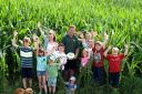 Owner Paul Caygill and children celebrate Easingwold Maze Maize’s tenth birthday