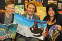 Fishergate School’s head teacher Andy Herbert with teachers Ben Allen and Jules Ayed and the books for the reading event aimed at dads
