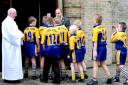 Members of the York Acorn rugby league side file into church for Sean's funeral