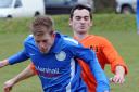 Poppleton United’s George Reilly moves in to tackle Old Malton St Mary’s player Danny Fogg, foreground, in their York Minster Engineering Football League  premier  division clash.