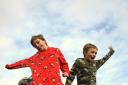 Elliot Ritchie, 12, left, and classmate Robert Gowland, 11, who are taking part in a sponsored 5k run in their onesies to raise money for Classrooms For Malawi