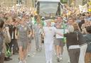 Stan Wild, pictured carrying the Olympic torch through York in 2012