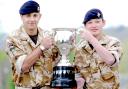 WINNERS: Troopers Ash Smith, and James Dalby, 19, from Heworth, of the Royal Dragoon Guards, pictured with the Pearn Trophy, awarded for best troop in D Squadron