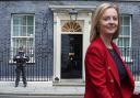 Photos via PA show 10 Downing Street and foreign secretary Liz Truss.