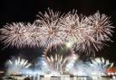 Fireworks lighting up the sky over the London Eye in central London during the New Year celebrations