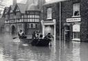Marygate in flood in 1982. At the front of this boat is Press reader Leslie Fraser of the 38 Engineer regiment who was called up for flood relief duty in York. Photo from Explore York archive