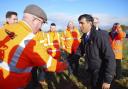 Prime Minister Rishi Sunak speaks to Network Rail employees as he visits a location on the site of the future Haxby railway station near York