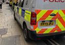 Two police vans and an ambulance at the scene of an incident in Pavement in York