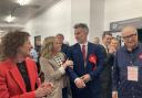 York and North Yorkshire's new Metro Mayor David Skaith, in the blue jacket, being congratulated by Labour supporters - including York council leader Claire Douglas , left - at the Harrogate Convention Centre after his victory on Friday
