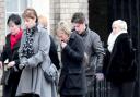 Vicki Horrocks, left, leaves the  inquest into the death of her son, Richard