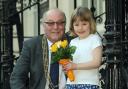 The Lord Mayor of York, Councillor David Horton, with his granddaughter Hannah Gibson on the steps at the Mansion House, where she will present a posy to the Queen