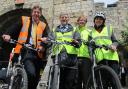 Saddled up for the Olympic Torch, from left, are  Graham Titchener, programme manager i-Travel York; Coun Dave Merrett; Shaun Wilkinson, road safety training co-ordinator; Jayne Ward, school crossing patrol supervisor