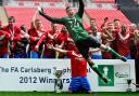 Goalkeeper Michael Ingham leads the after match celebrations after their win against Newport County