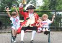 Pocklington Montessori School pupils enjoy ringing their bells and shaking other   musical instruments with town crier Geoff Sheasby