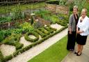 Julia Unwin, left, from the Joseph Rowntree Trust, and Councilor Sonia Crisp, with the York800 garden at the Homestead
