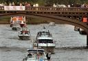 A group of boats join the flotilla as crowds watch from Skeldergate Bridge