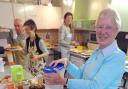Volunteer Hilda Carney serving breakfast at Carecent in St Saviourgate
