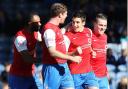 ROAD WARRIORS: York City celebrate a 1-0 win over Portsmouth last March