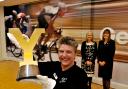 Heather Kennedy, of Wigan Leisure Culture Trust, holds the Tour de Yorkshire trophy watched by Rose Norris, left, executive director of Selby District council, and Mary Weastell, chief executive of the council