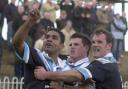DAD: Alex Godfrey, left, celebrates his match-winning try as York City Knights beat Featherstone in a memorable 2004 Challenge Cup tie, despite having played most of the game a man down