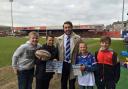 James Ford with the four lucky lads after last week's match