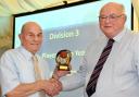 PRIZE: Veteran Geoff Deighton from Retreat II receives the Division 3 Player of The Year Award from Mike Wellock. Picture: David Harrison.