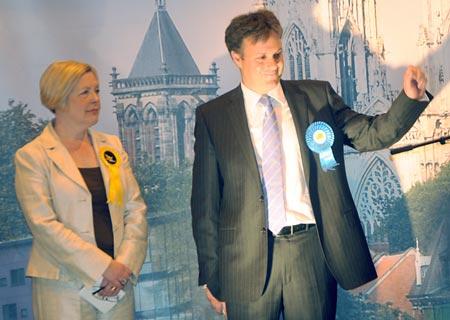 York Outer Conservative candidate Julian Sturdy acknowledges his victory, flanked by Lib Dem opponent Madeleine Kirk