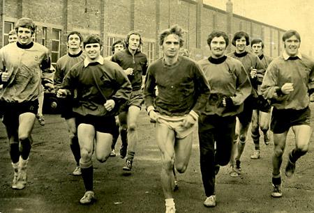 18/11/70: York international runner Walter Wilkinson takes York City players on a run to Knavesmire and back. Included are: Phil Boyer, Paul Aimson, Keith Newman, Phil Burrows, Ron Hillyard, Ian Davidson, David Jones, Chris Topping and John Mackin.